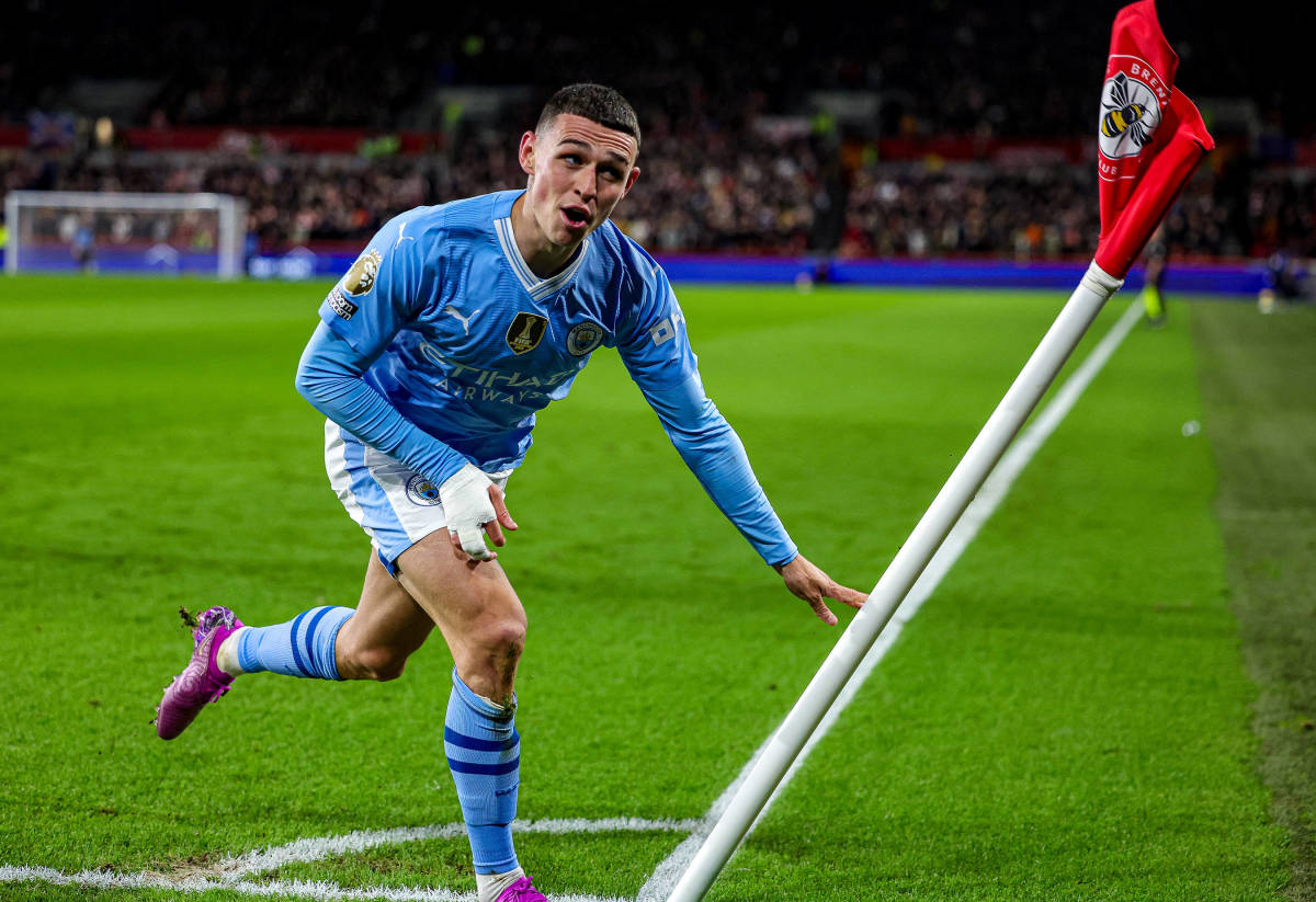 Hat-trick hero Phil Foden pictured celebrating one of his three goals during Manchester City's 3-1 win at Brentford in February 2024